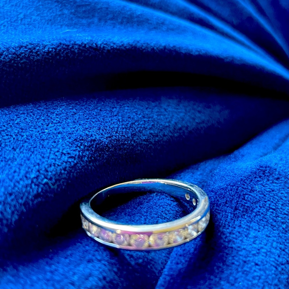 Flawless 1 Ct. SI1 18K white gold diamond band from Bailey Banks & Biddle.